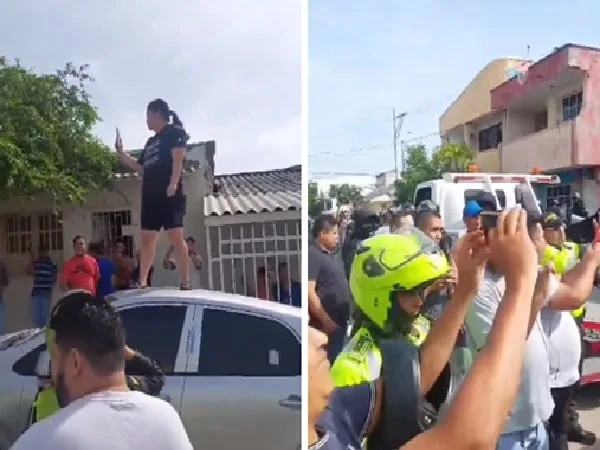 Mujer se paró encima de su carro para evitar inmovilización de su vehículo.