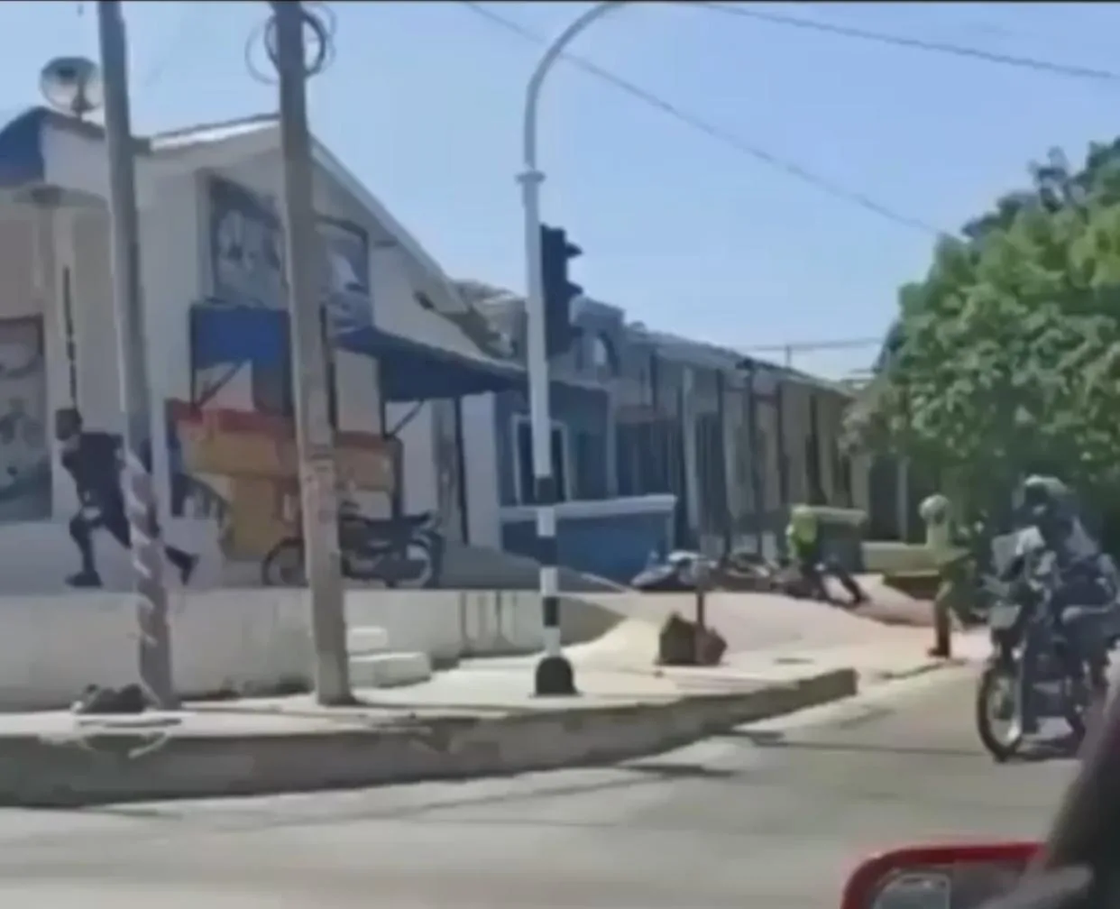 robando en Barranquilla y les quemaron la moto