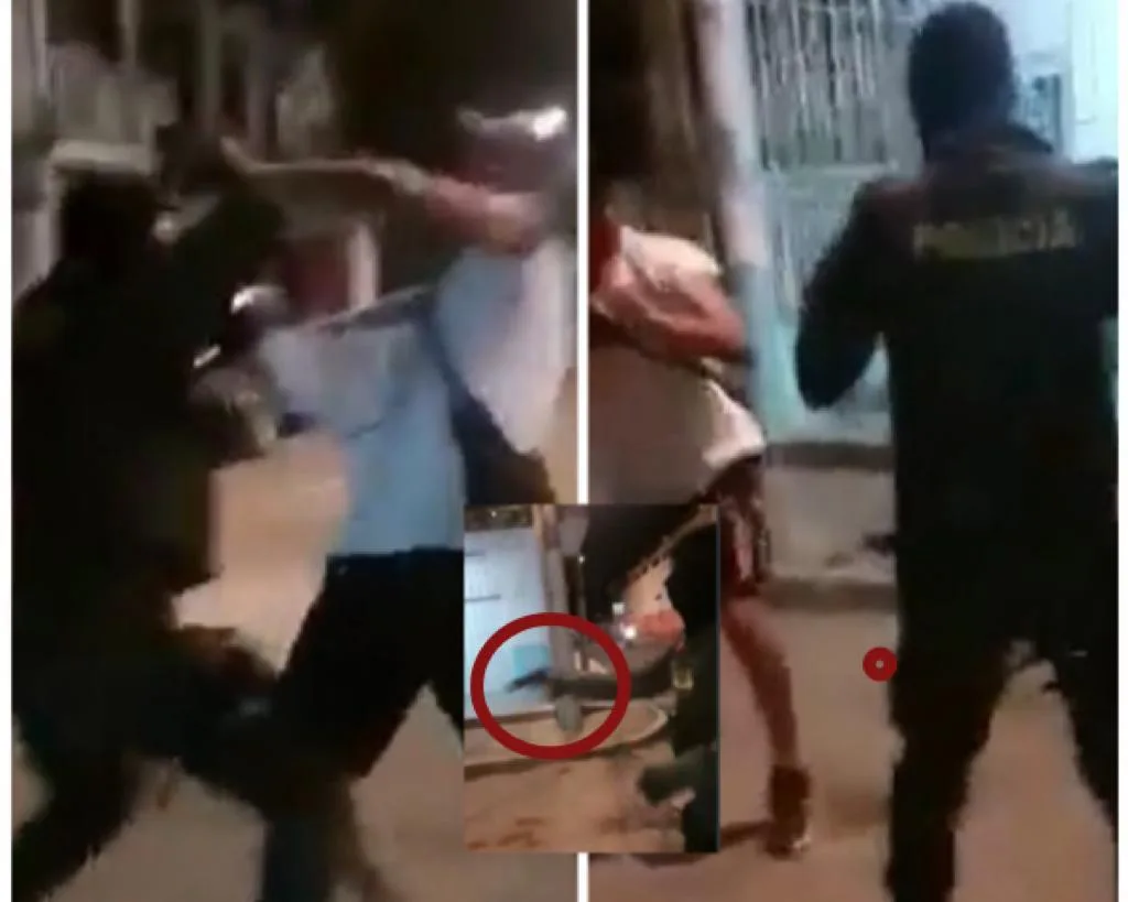 pistola policía Cali