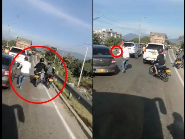 Tiraron a romper el vidrio del carro para robarlo en medio del trancón, eran varios motorizados y quedaron grabados