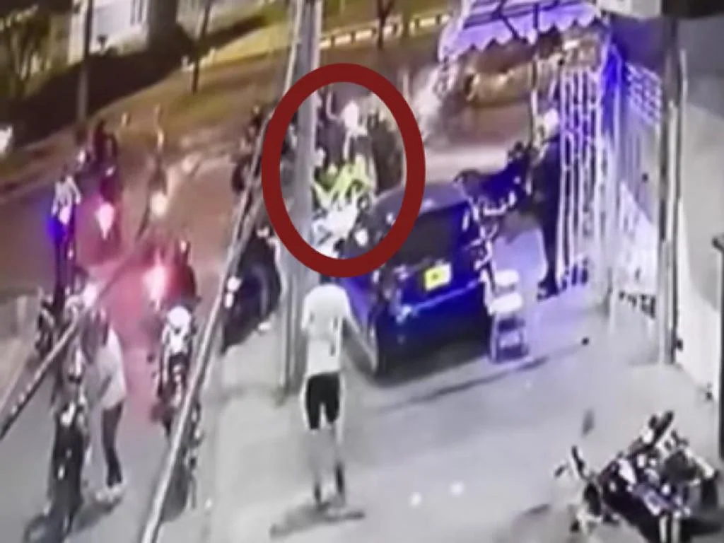 estanco en Cali patrulla policial