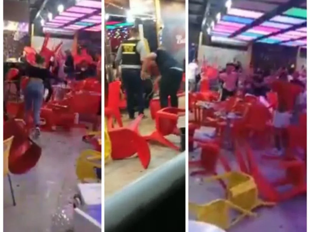 Con las sillas en la cabeza para protegerse de los botellazos, en un billar en Barranquilla