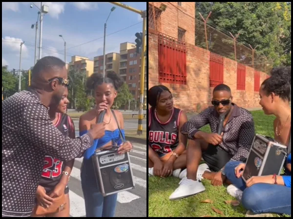 Andy Caicedo con artistas en un semáforo