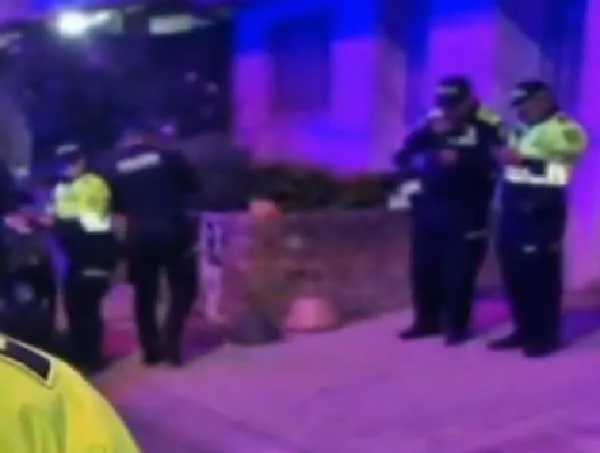 Policía disparó a su esposa y a otro hombre dentro de motel en Bogotá.