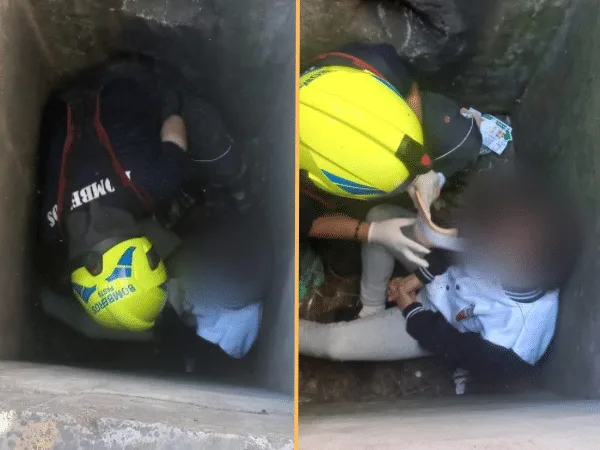 El cuerpo de Bomberos hicieron el rescate de la mujer que cayo en colector de aguas residuales de la carretera.